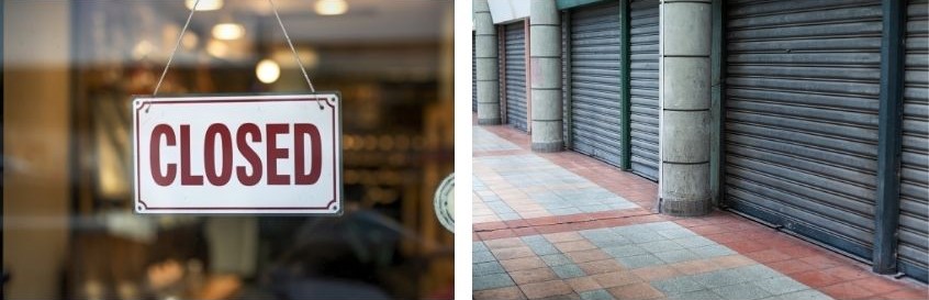 Foto con cartello CLOSED e negozi con serrande abbassate